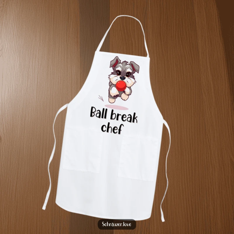 Funny Schnauzer Apron showing a schnauzer chasing a bouncing red ball, adding playful humor to cooking.