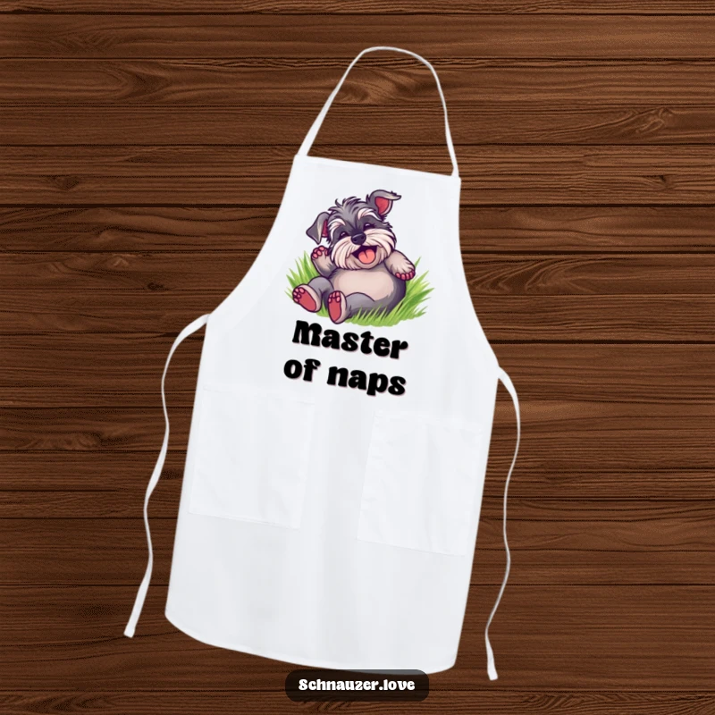 Funny Schnauzer Apron showing a delighted dog rolling on its back in green grass, bringing a smile to any kitchen task.