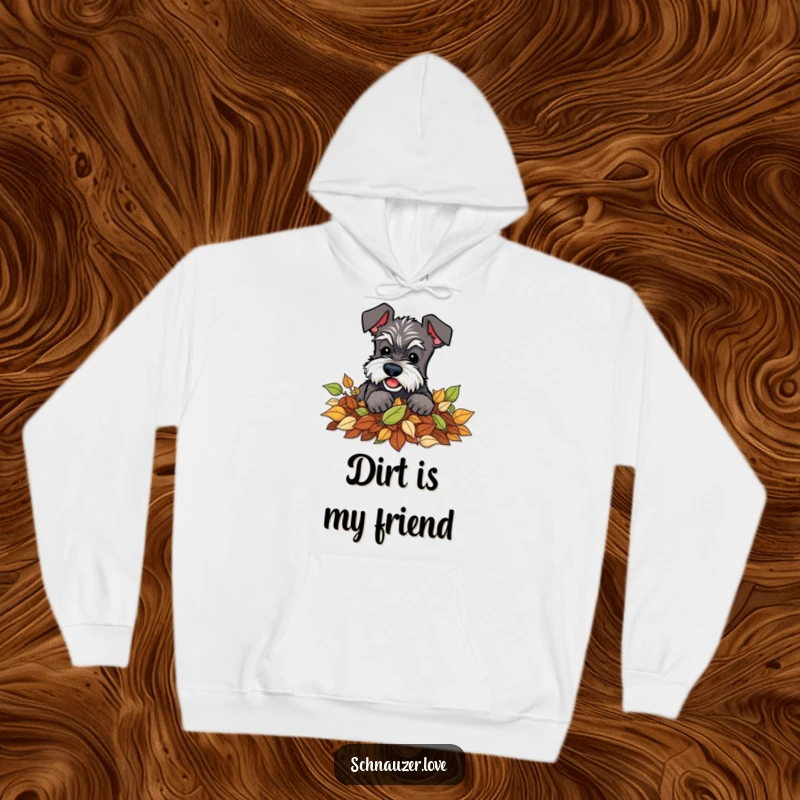 Funny Schnauzer Hoodie: A playful schnauzer character digging energetically into a large pile of leaves, ideal for autumn comfort.