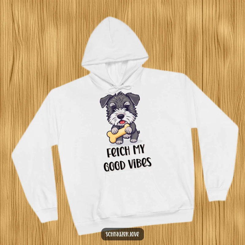 Funny Schnauzer Hoodie: A fluffy schnauzer in full sprint, eagerly fetching a bone, radiating pure doggy fun.