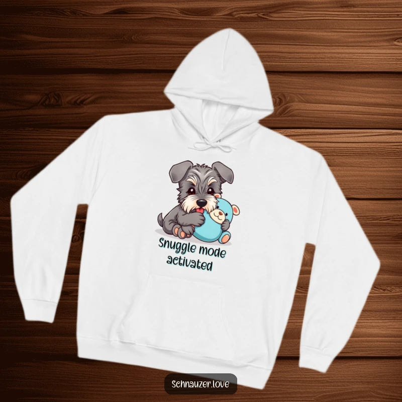 Funny Hoodie: A schnauzer with floppy ears is depicted happily embracing a plush toy, embodying comfort and playful humor.