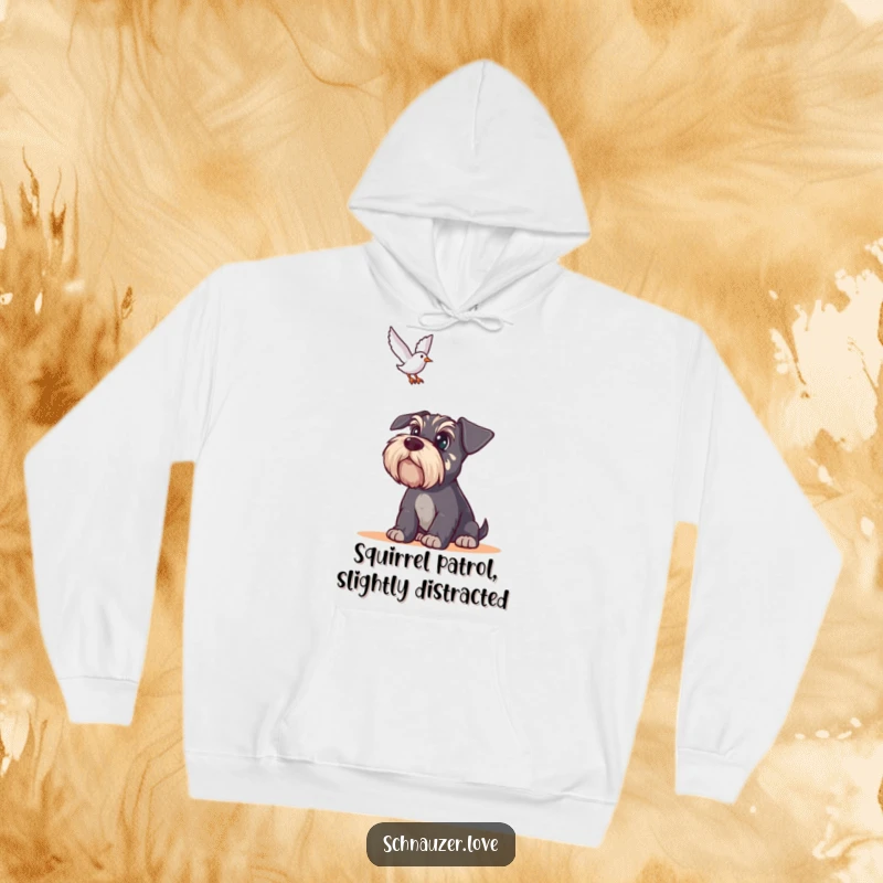 Funny Schnauzer Hoodie: An alert schnauzer with big eyes tracks a bird flying overhead, embodying humorous watchfulness.