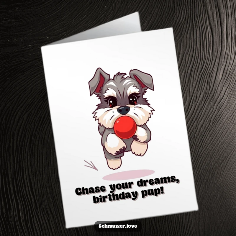 Funny Free Printable Birthday Card: A fluffy Schnauzer joyfully chases a bouncing red ball. Active and playful art.