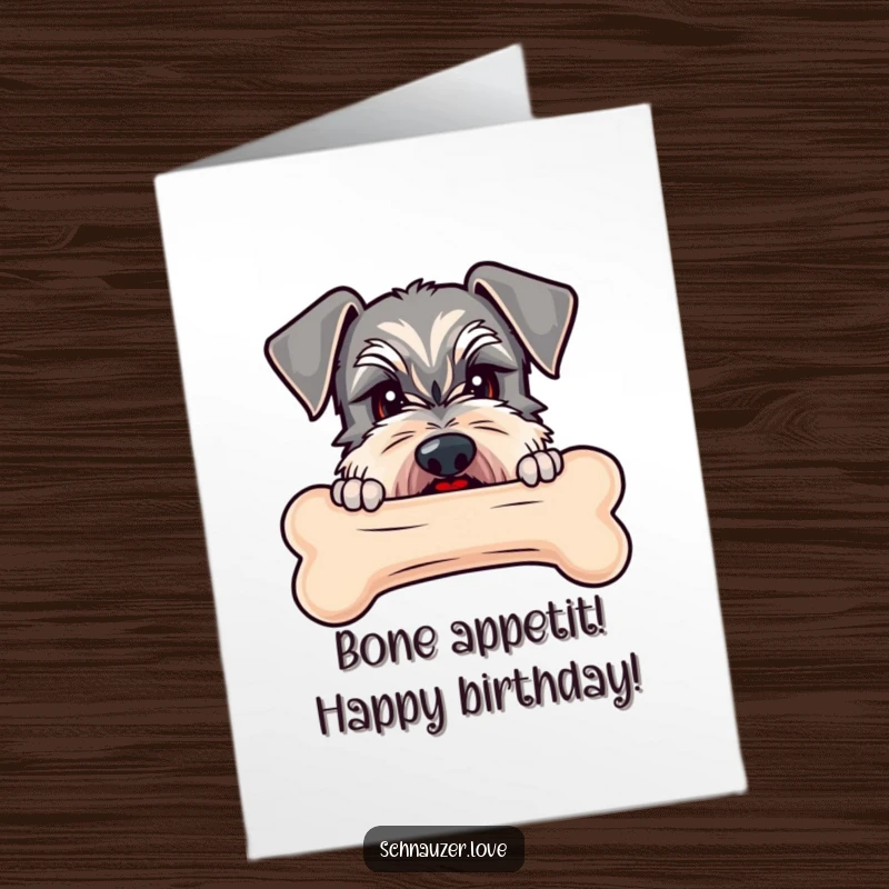 Funny Free Printable Schnauzer Birthday Card: A schnauzer peeking mischievously over a giant bone, ready for treats.