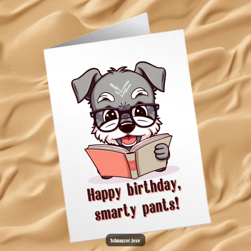 Funny Free Printable Birthday Card: a smiling Schnauzer in tiny glasses reads a book, celebrating knowledge and fun.