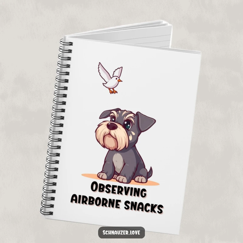 Funny Schnauzer Notebook: A schnauzer with wide eyes intently watches a bird fly overhead, ready for your notes and ideas.