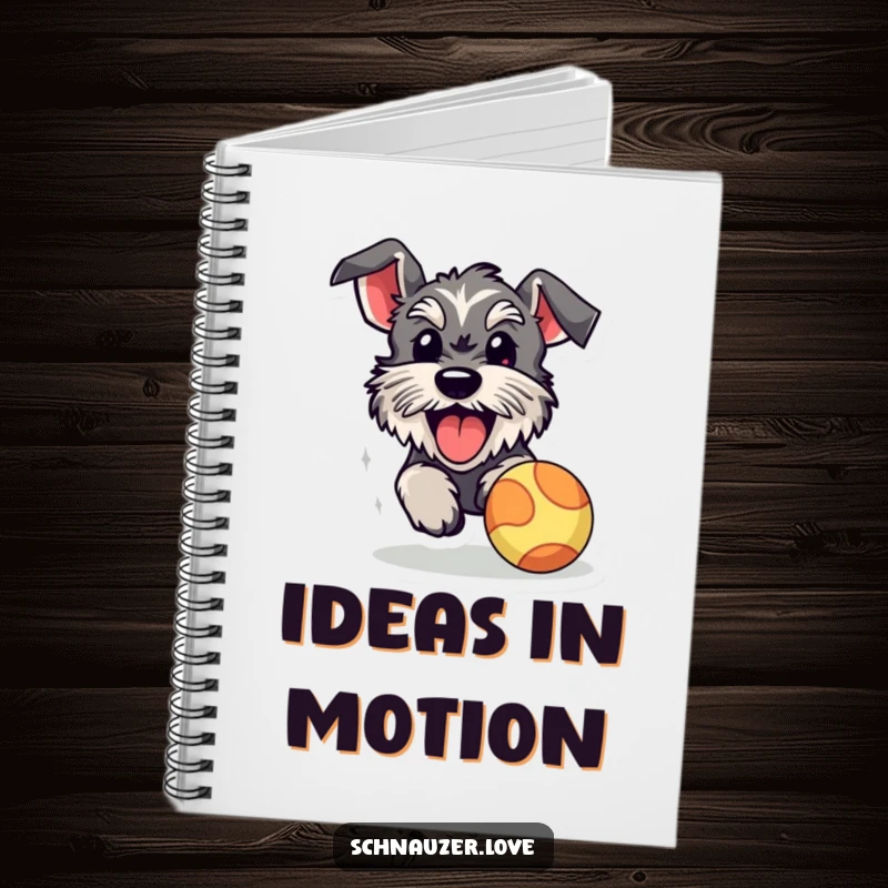 Funny schnauzer notebook, a cover with a happy dog with its tongue out, chasing a bouncy ball, perfect for jotting down active plans.