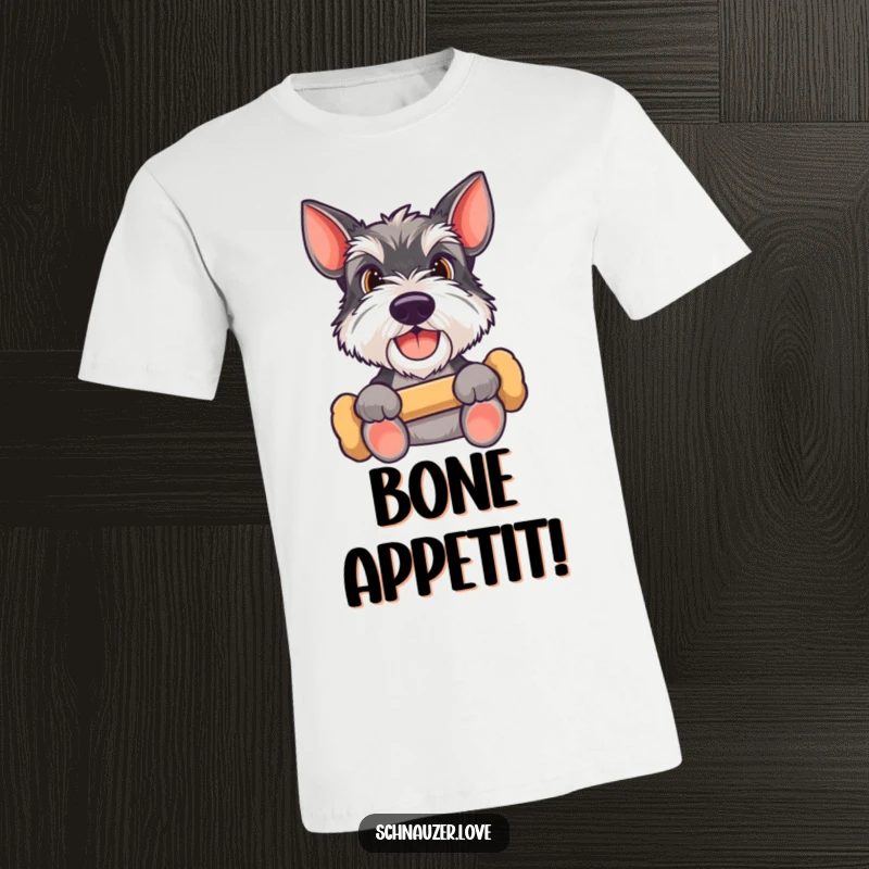 Funny Schnauzer t-shirt featuring a happy dog holding a bone, looking up expectantly, capturing the essence of canine hope and treat desire.