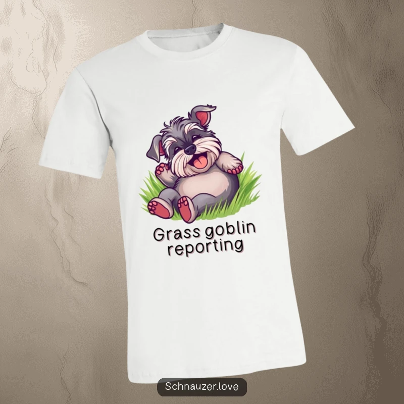 Funny Schnauzer T-Shirt showcasing a happy dog exuberantly rolling on its back in soft green grass, embodying pure delight.
