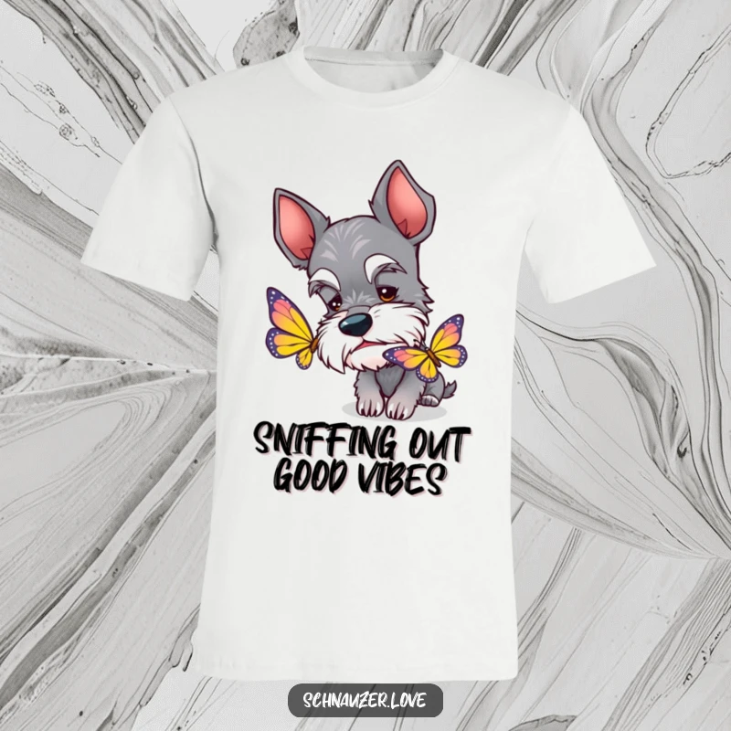 Funny Schnauzer T-Shirt: A curious schnauzer with perked ears sniffing a colorful butterfly, showcasing canine charm.