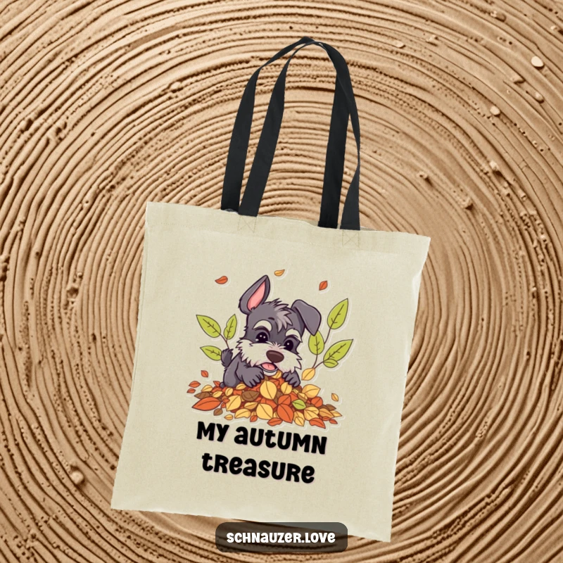 Funny Schnauzer Tote Bag: Schnauzer character digging happily in a pile of autumn leaves, ideal for carrying seasonal items.