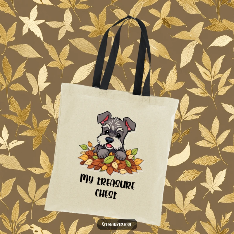 Funny Schnauzer Tote Bag: Depicts a schnauzer playfully digging amongst a pile of fallen leaves, a practical and fun accessory.
